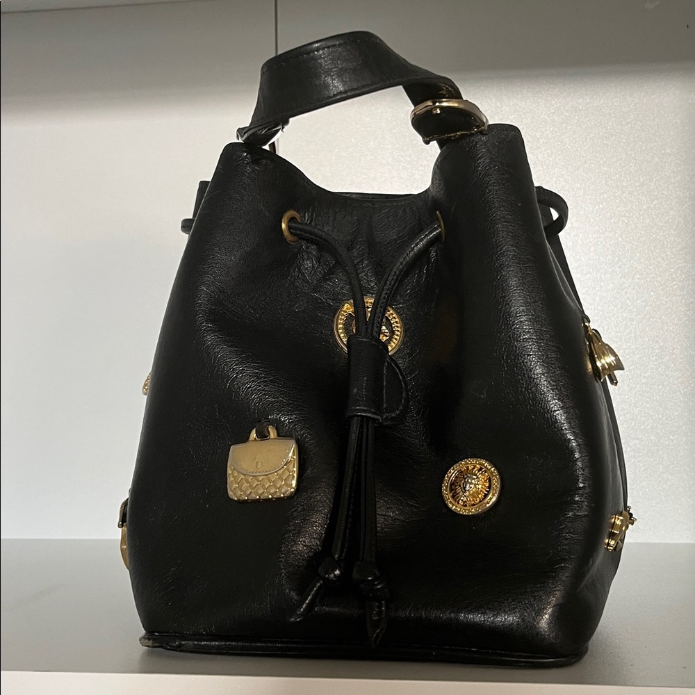 Unique Chic Black Bucket Bag with Gold Details